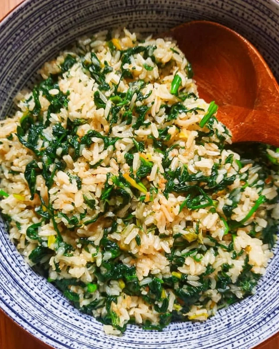 Delicious plate of spinach rice garnished with herbs and spices.